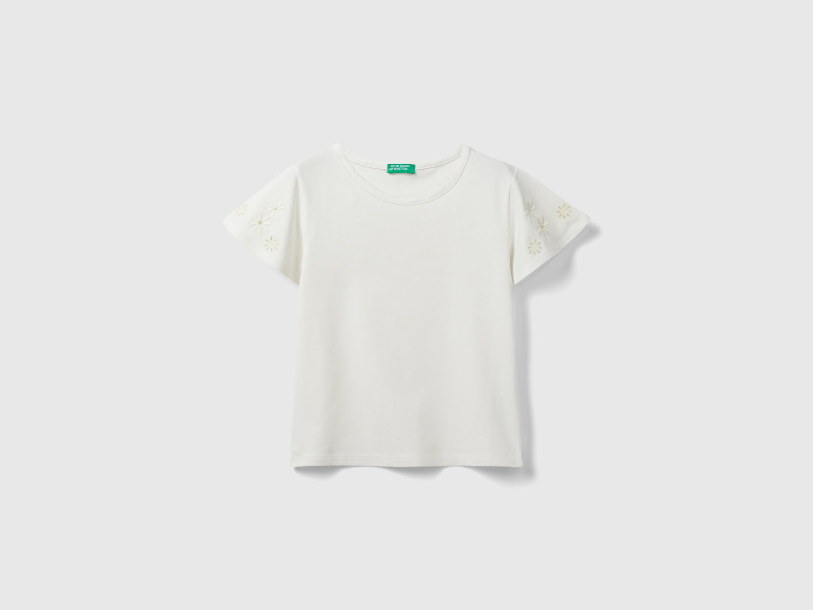 T-shirt con ricami floreali da bambina bianco panna | Benetton Outlet