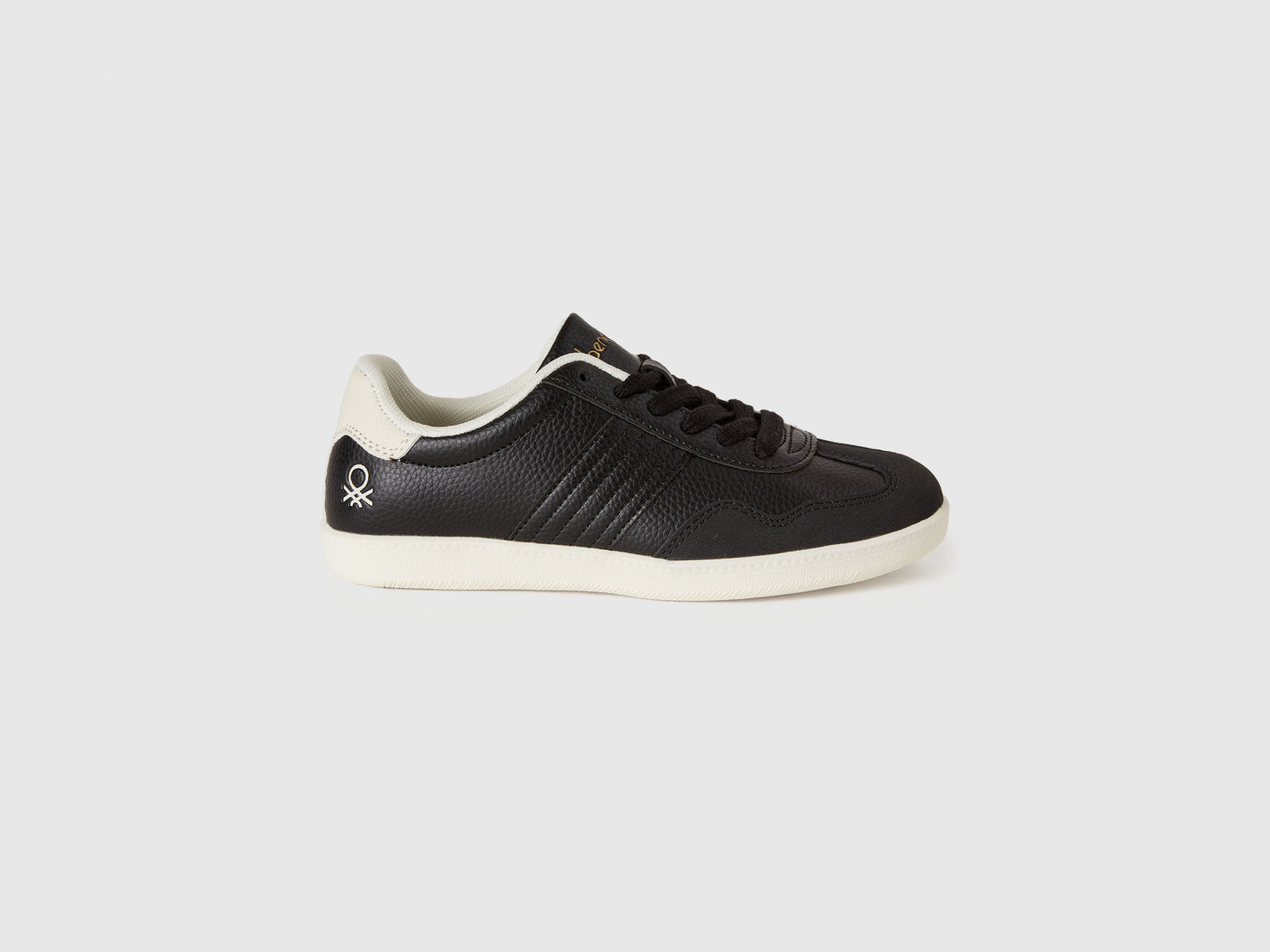 Sneakers in tessuto spalmato e scamosciato da bambino nero | Benetton Outlet