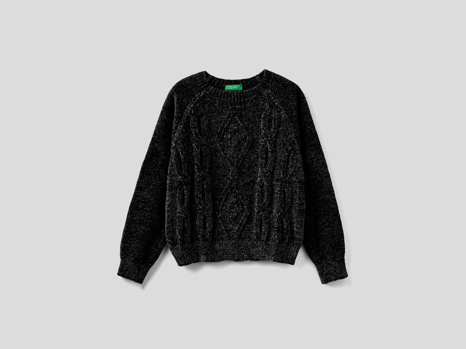 Maglia con trecce in ciniglia da bambina nero | Benetton Outlet