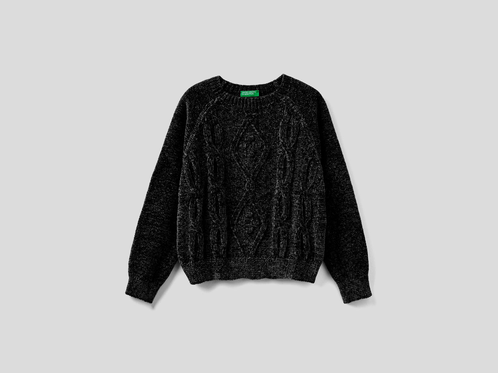 Maglia con trecce in ciniglia da bambina nero | Benetton Outlet