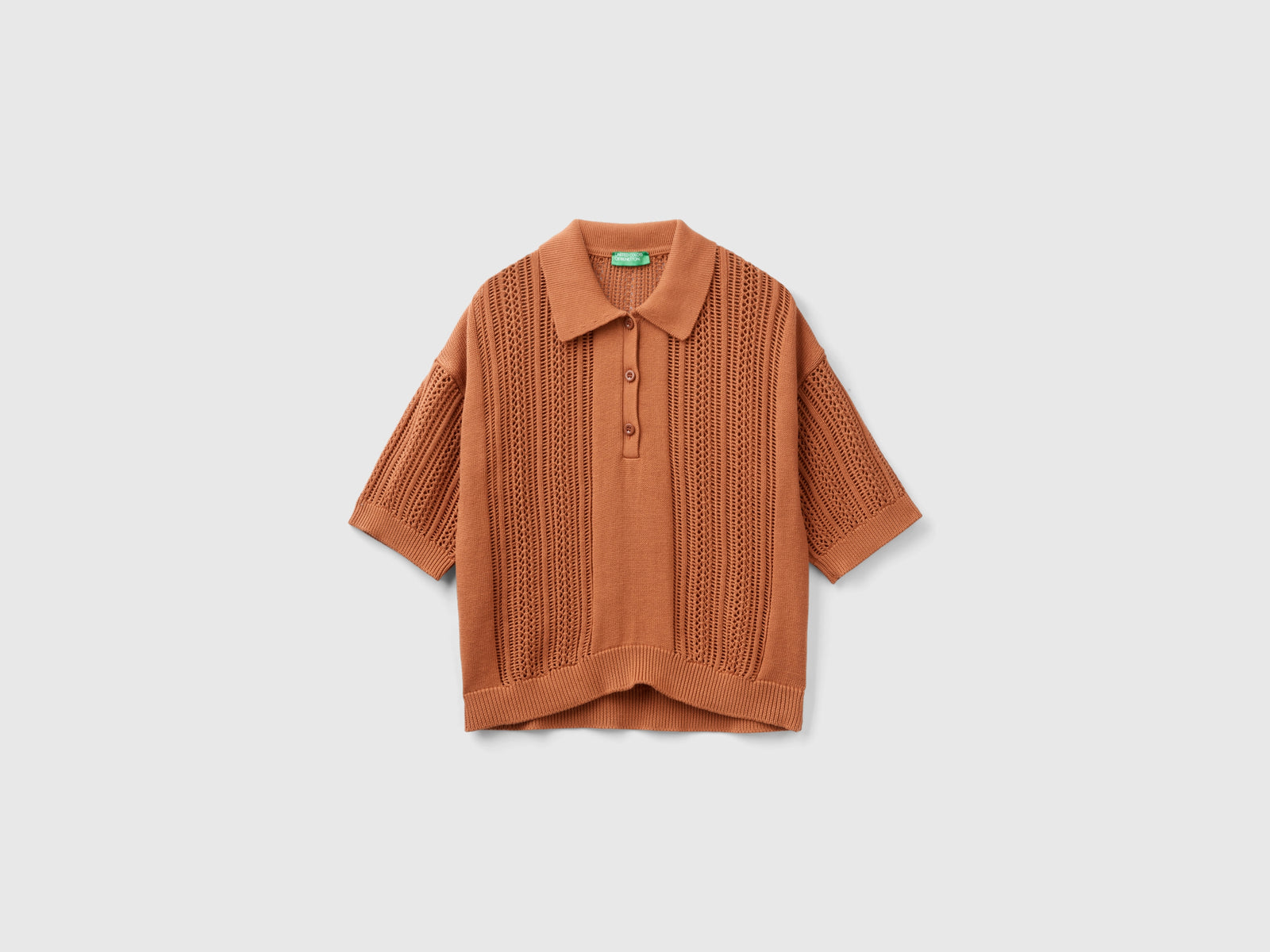 Polo in maglia crochet da donna bruciato | Benetton Outlet