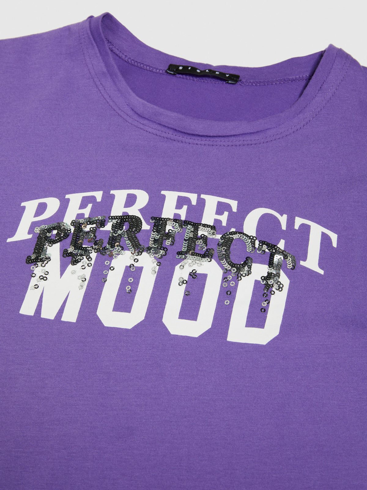 T-shirt con stampa e paillettes