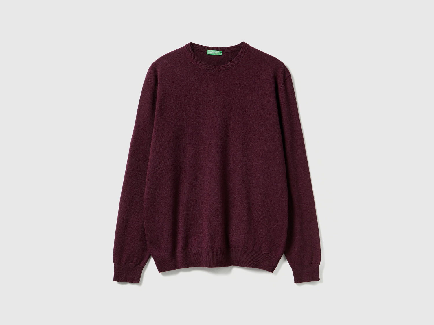 Maglia girocollo prugna in pura lana Merino da uomo bordeaux | Benetton Outlet