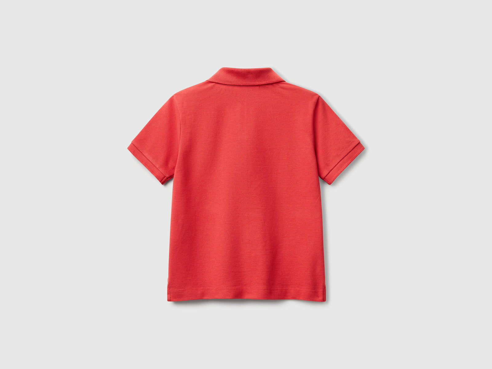 Polo con ricamo Snoopy ©Peanuts da bimbo rosso mattone 2 | Benetton Outlet