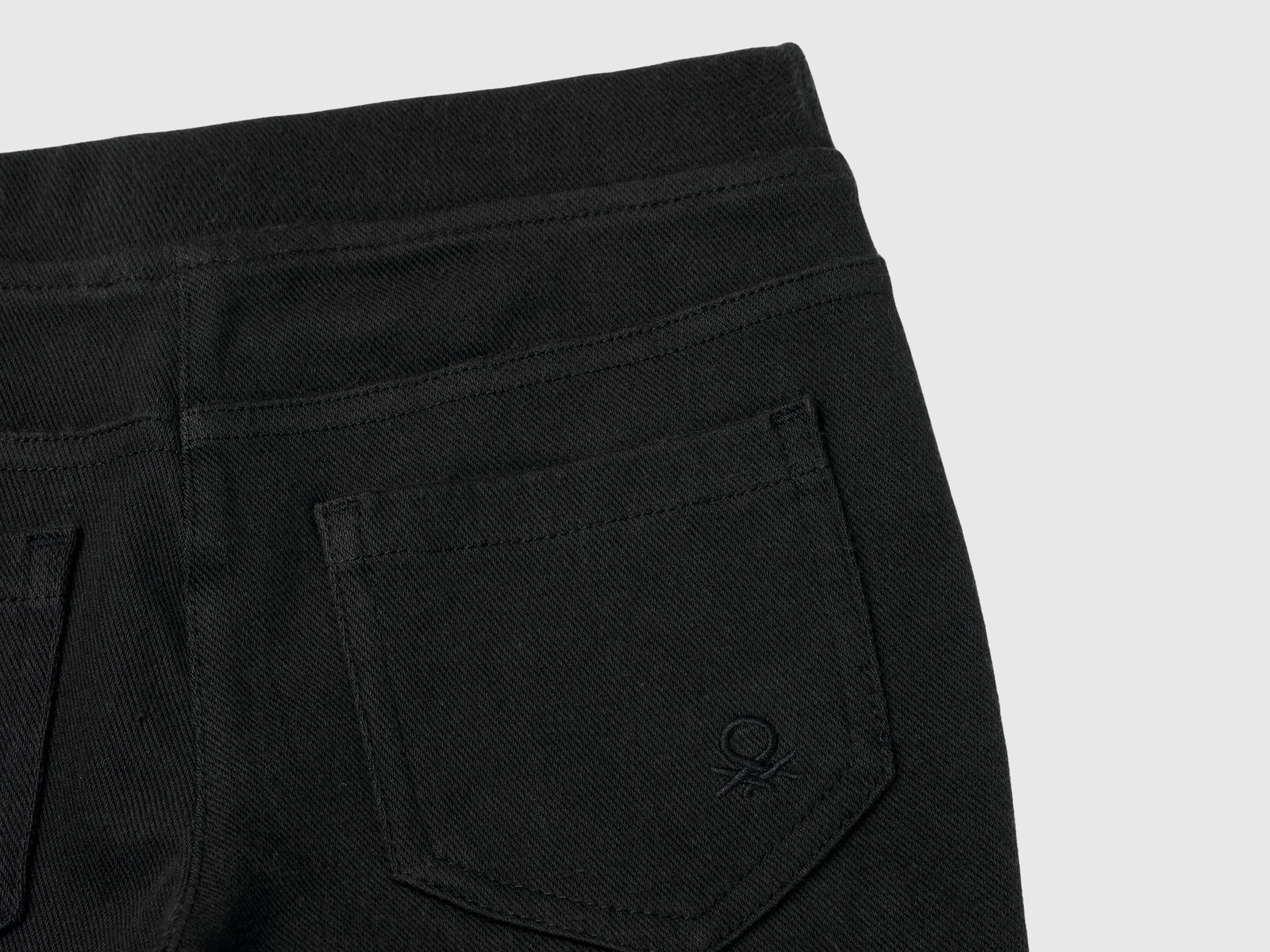 Pantaloni in felpa super stretch da bimba nero 3 | Benetton Outlet