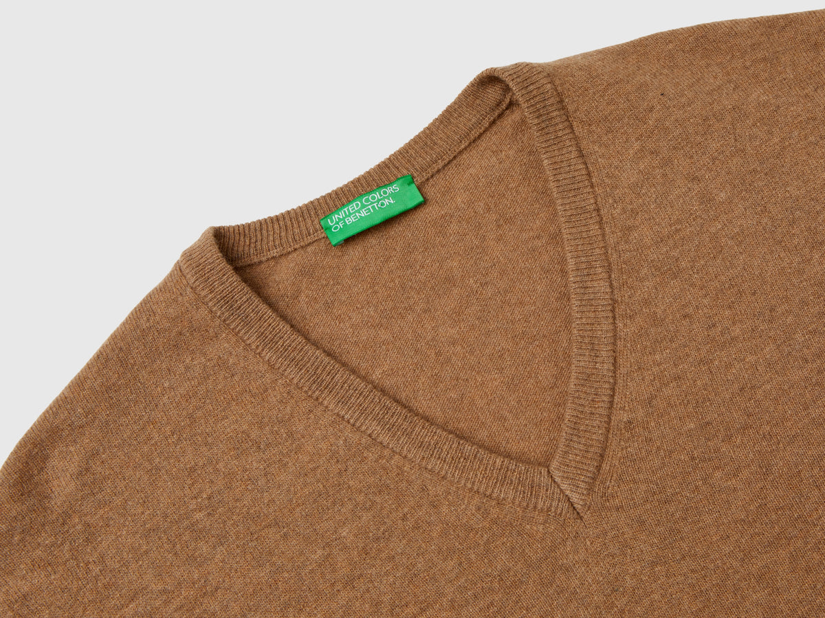 Maglia scollo a V mélange in pura lana Merino