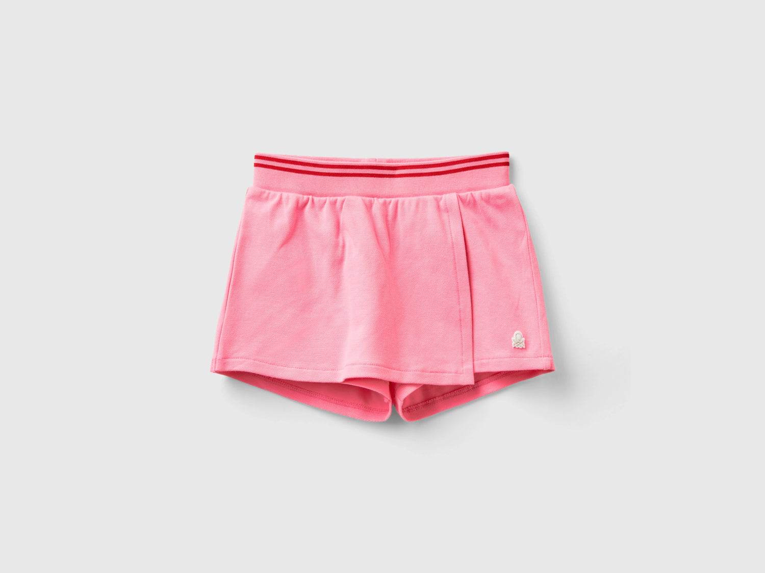 Gonna pantalone in cotone bio stretch da bimba rosa | Benetton Outlet