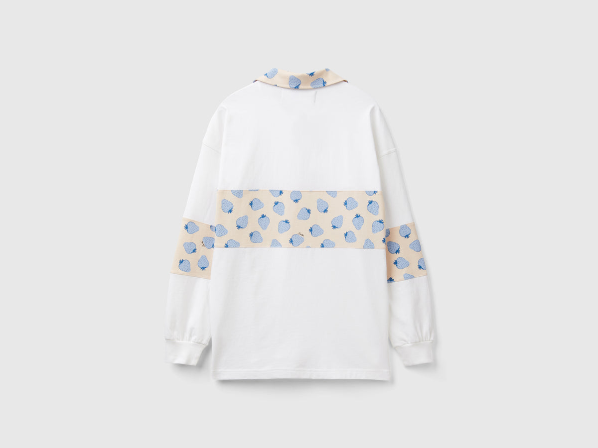 Polo rugby con dettagli pattern fragole