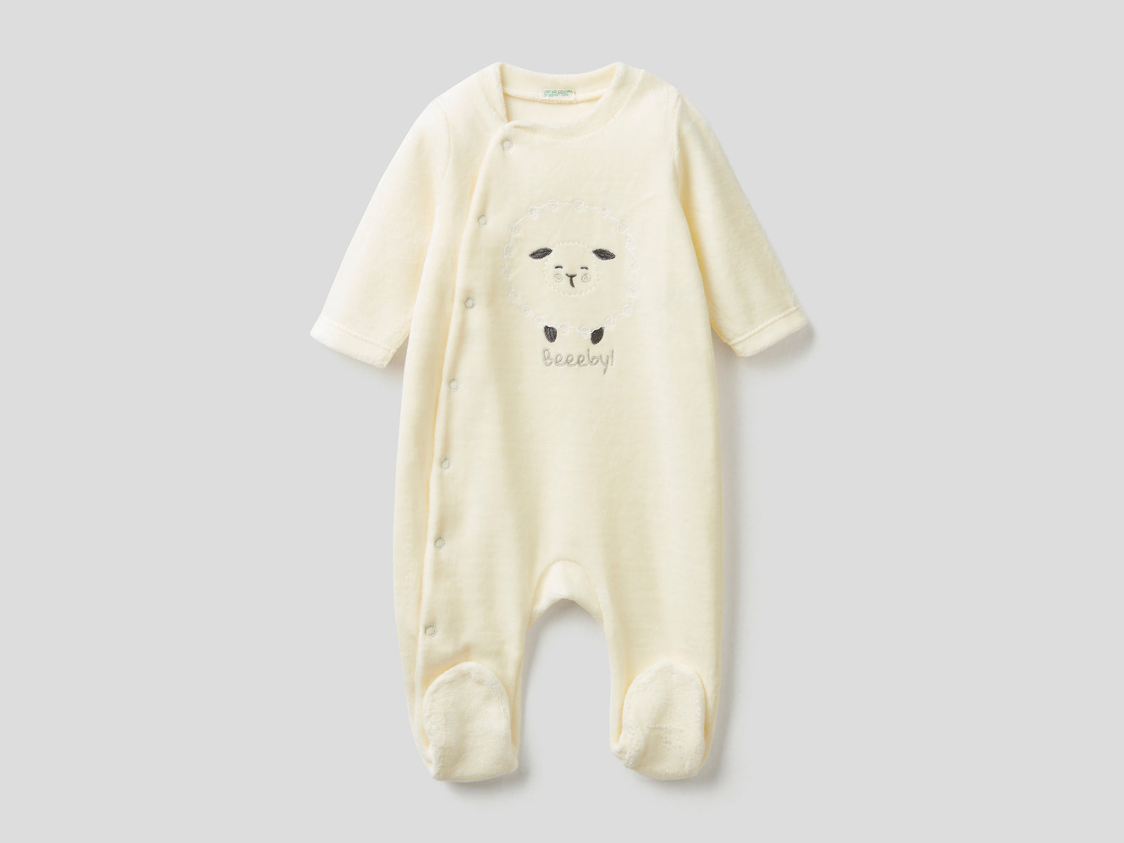 Tutina in ciniglia di misto cotone da neonato bianco panna | Benetton Outlet