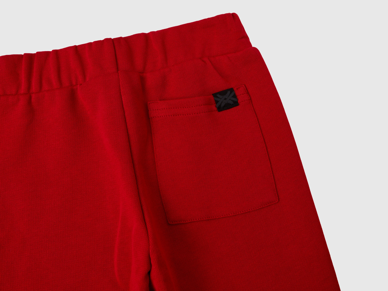 Tuta in felpa con logo da bimbo rosso 2 | Benetton Outlet