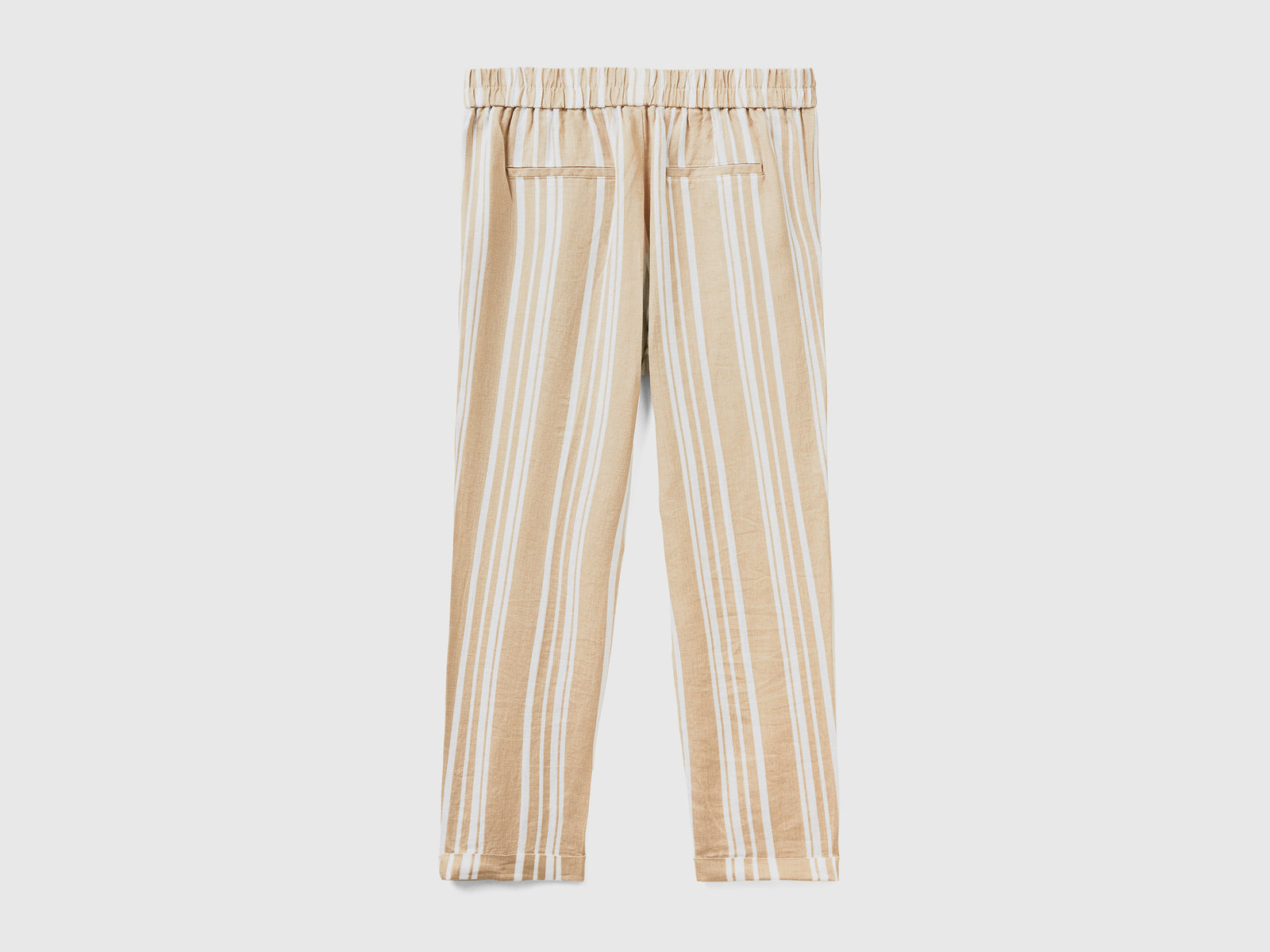 Pantaloni lunghi con stampa fantasia da donna beige 2 | Benetton Outlet