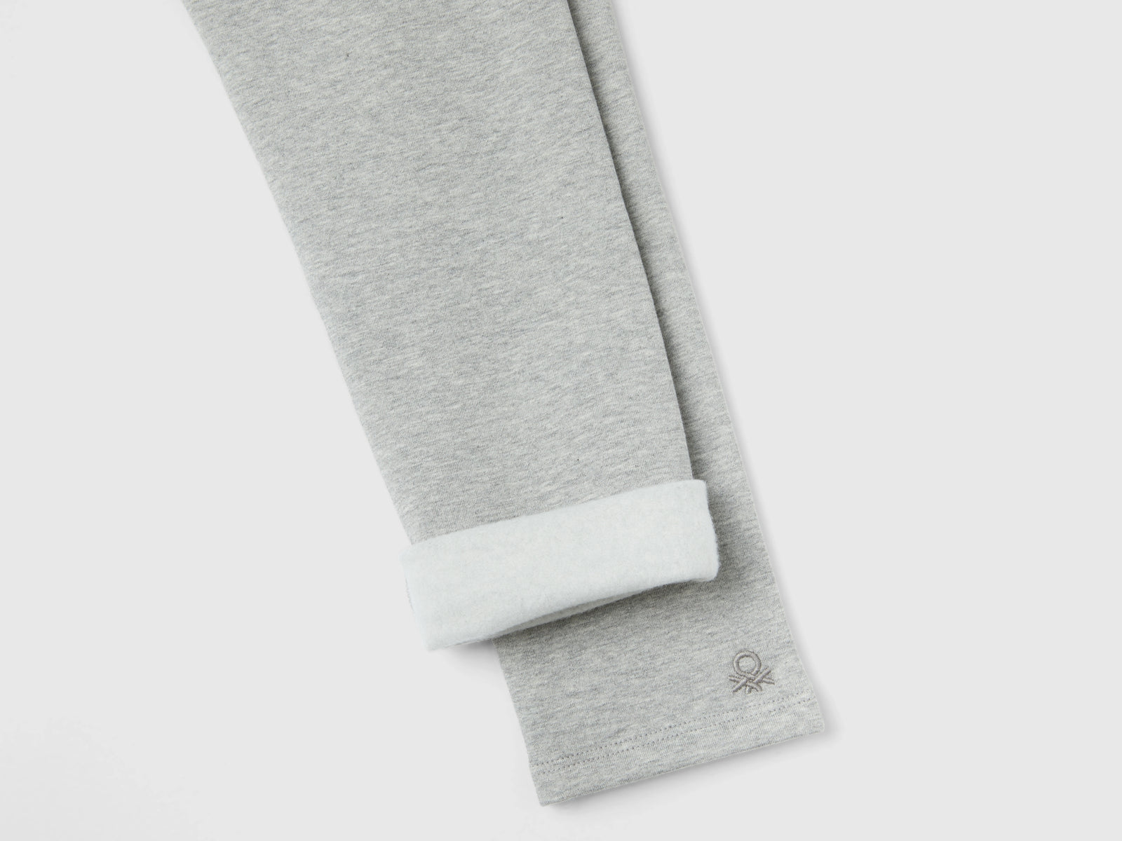 Caldi leggings felpati da bambina grigio chiaro 2 | Benetton Outlet