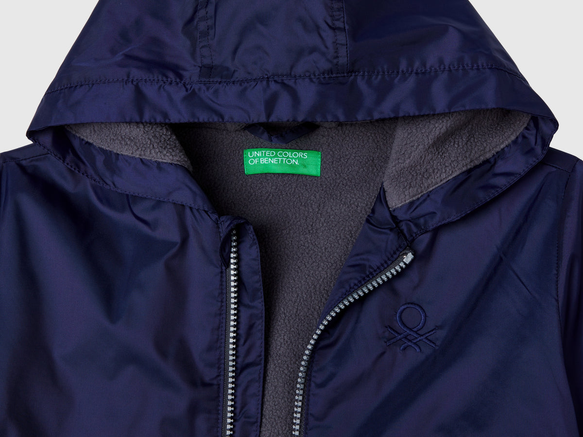 Giubbino in nylon con zip e cappuccio