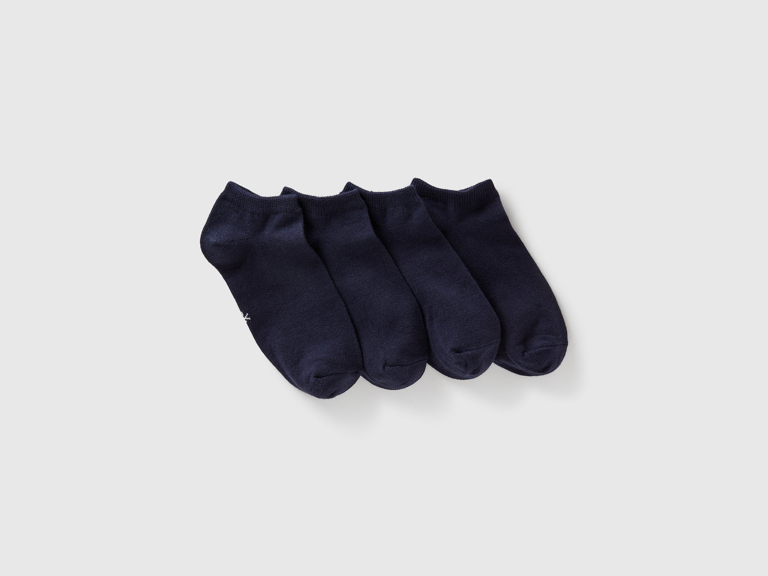 Quattro paia di calzini corti da bambino blu scuro | Benetton Outlet