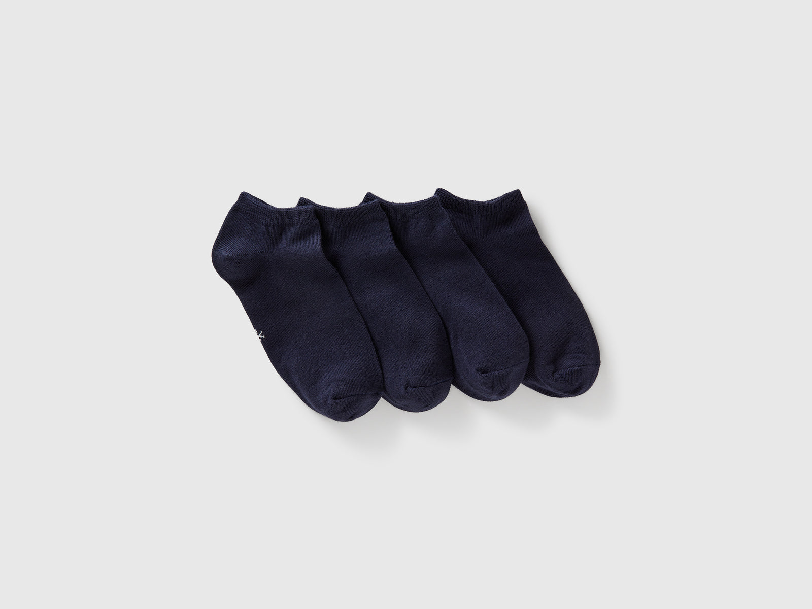 Quattro paia di calzini corti da bambino blu scuro | Benetton Outlet
