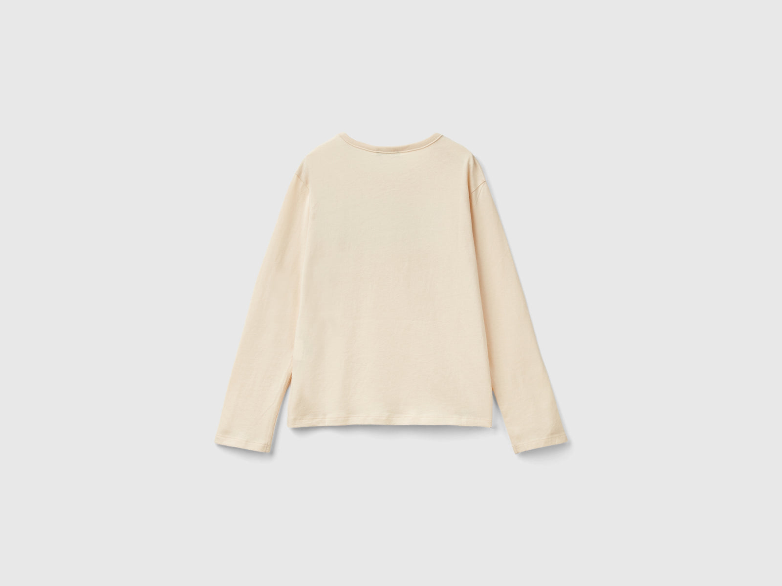 T-shirt in caldo cotone bio con paillettes da bambina bianco panna 2 | Benetton Outlet