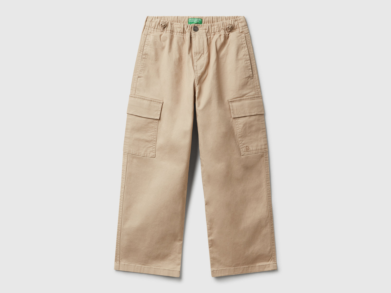 Pantaloni parachute in cotone stretch da bambino beige | Benetton Outlet