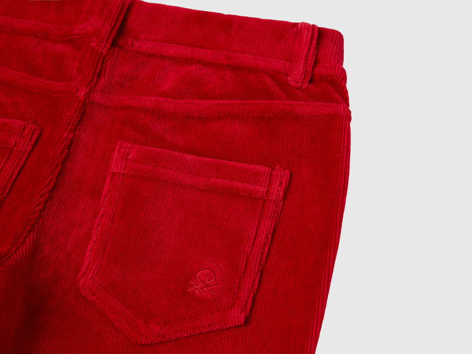 Pantaloni super skinny in ciniglia da bambina rosso 3 | Benetton Outlet