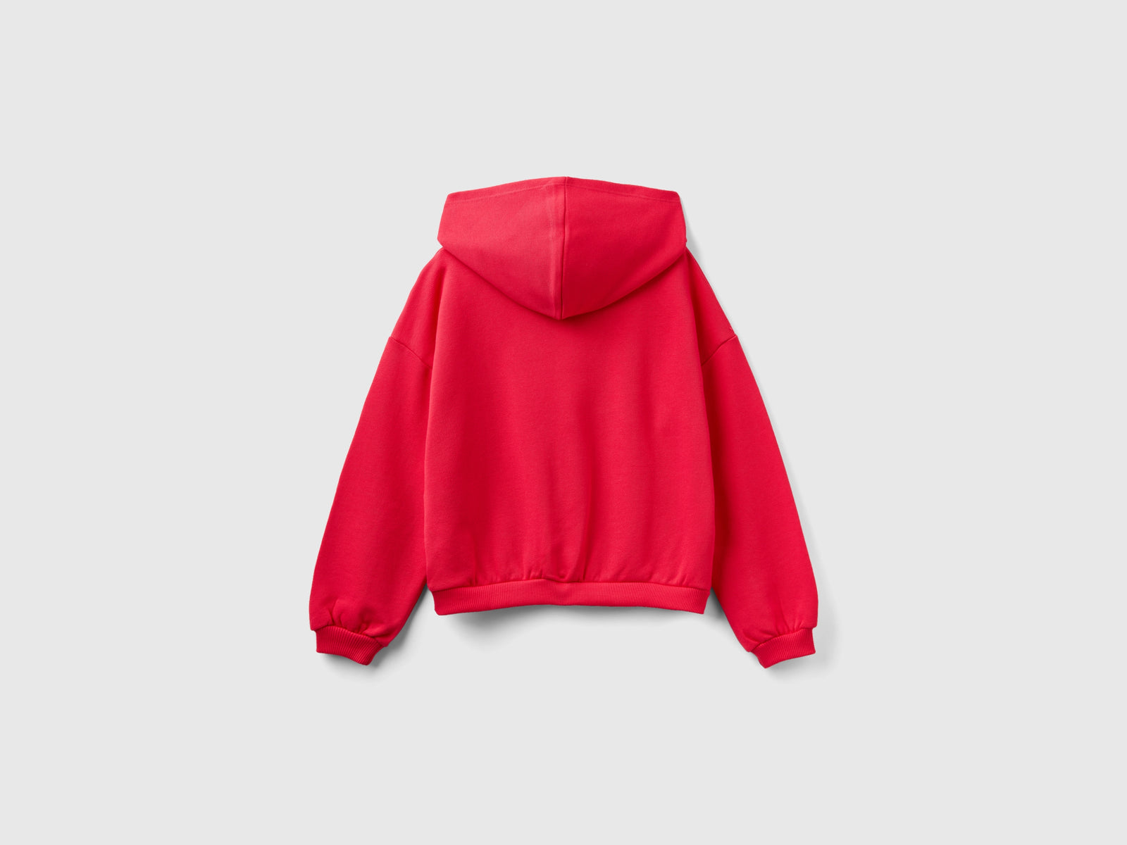 Felpa con cappuccio e maxi logo da bambina fucsia 2 | Benetton Outlet