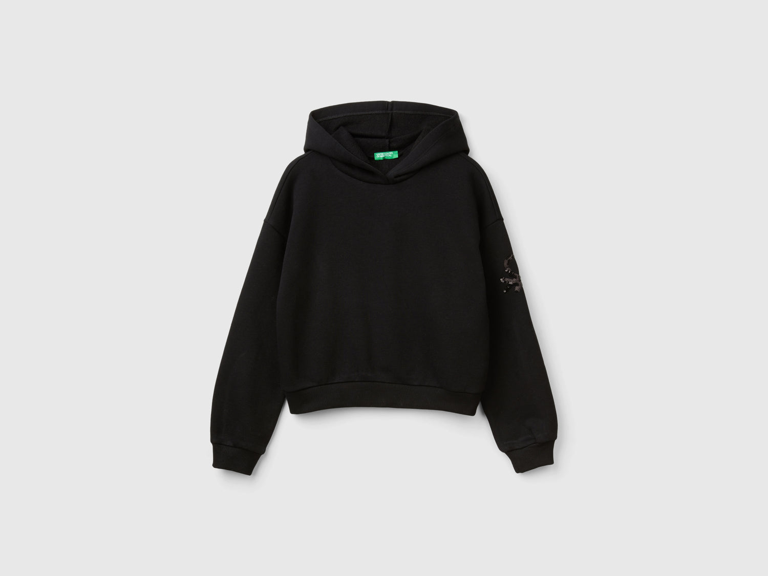 Felpa con cappuccio e paillettes da bambina nero | Benetton Outlet
