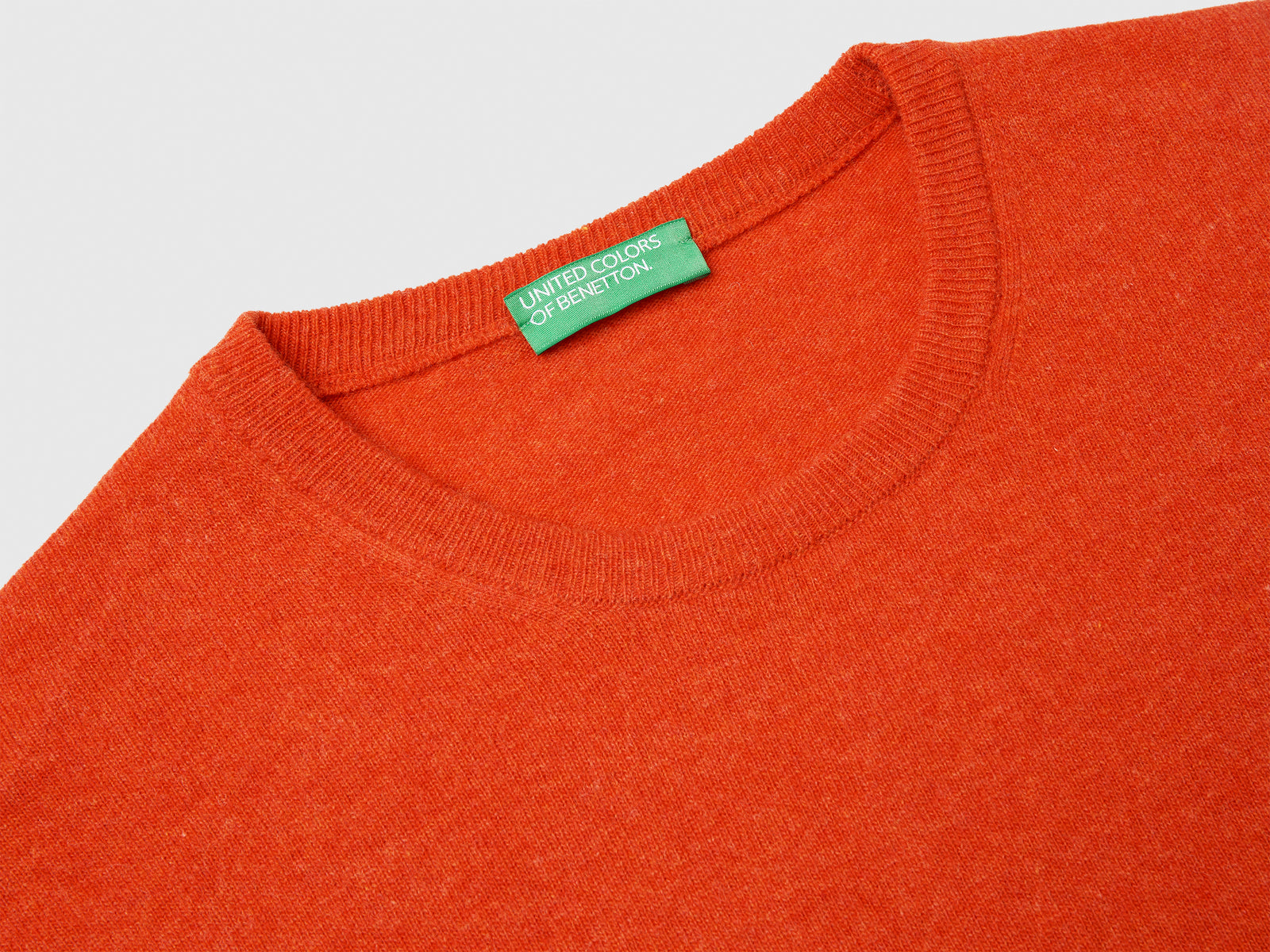 Maglia girocollo mélange in pura lana Merino da uomo arancione 3 | Benetton Outlet