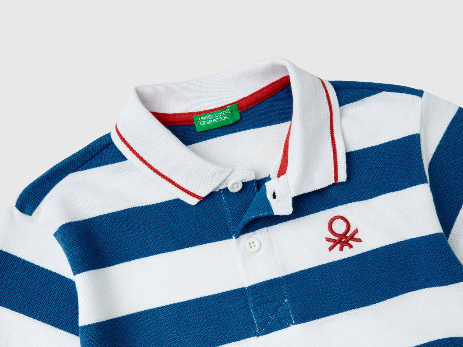Polo manica corta a righe da bambino azzurro 2 | Benetton Outlet