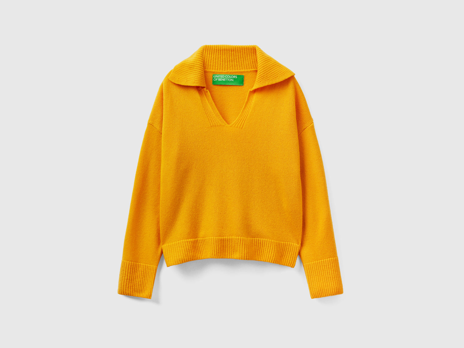 Maglia boxy fit con collo a polo da donna giallo | Benetton Outlet