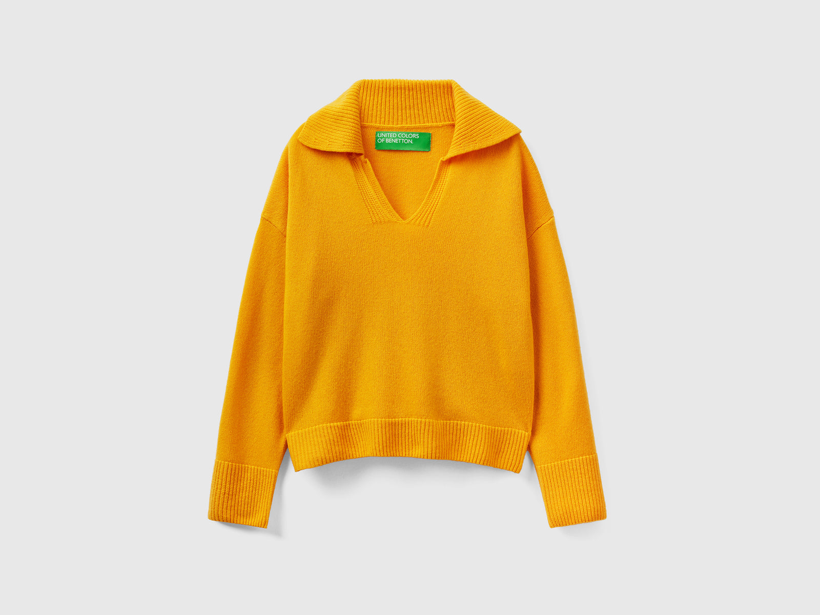 Maglia boxy fit con collo a polo da donna giallo | Benetton Outlet