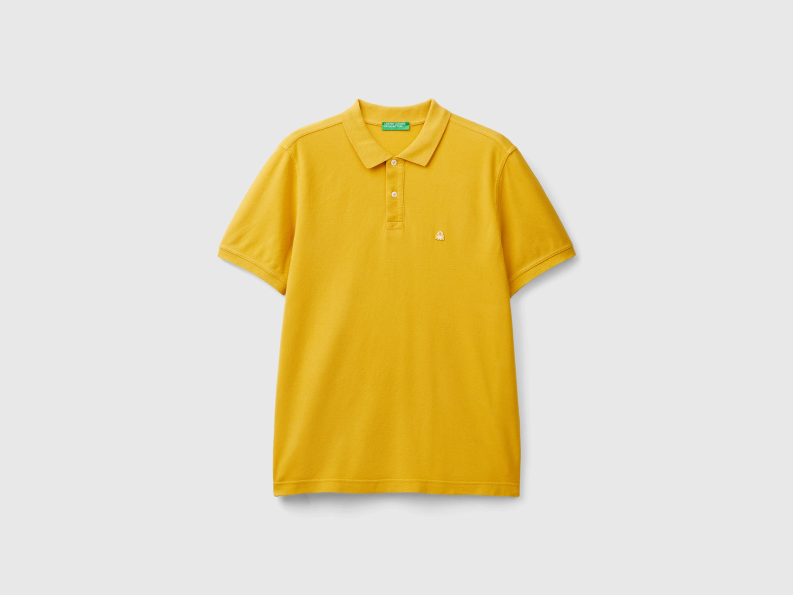 Polo giallo ocra regular fit da uomo senape | Benetton Outlet