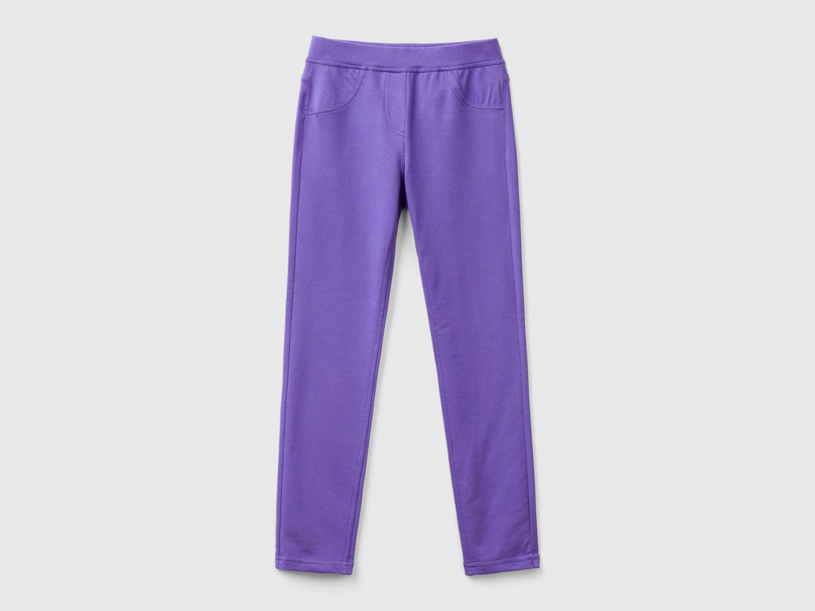 Jeggings in felpa stretch da bambina viola | Benetton Outlet