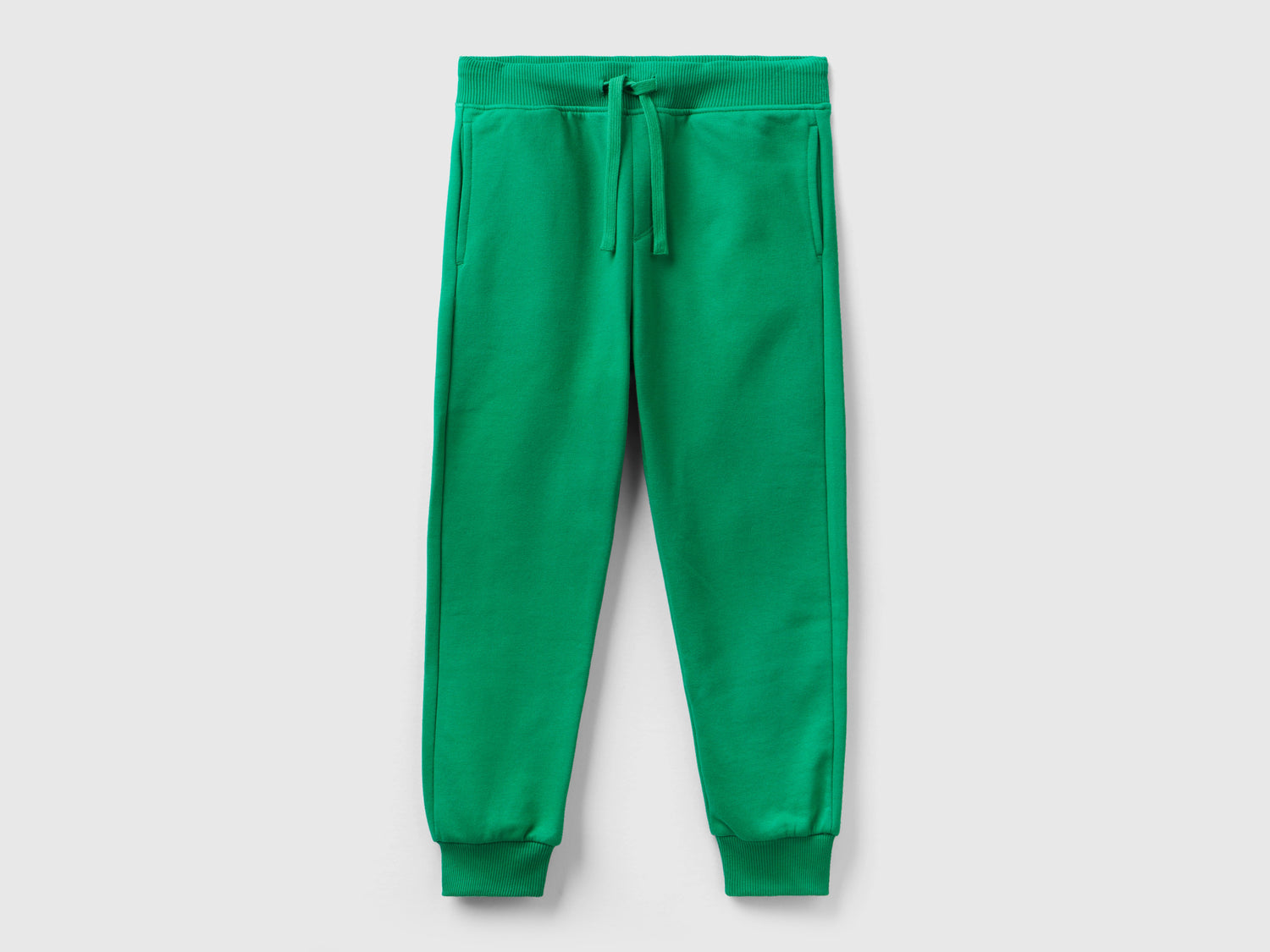 Pantaloni in calda felpa con stampa da bambino verde | Benetton Outlet