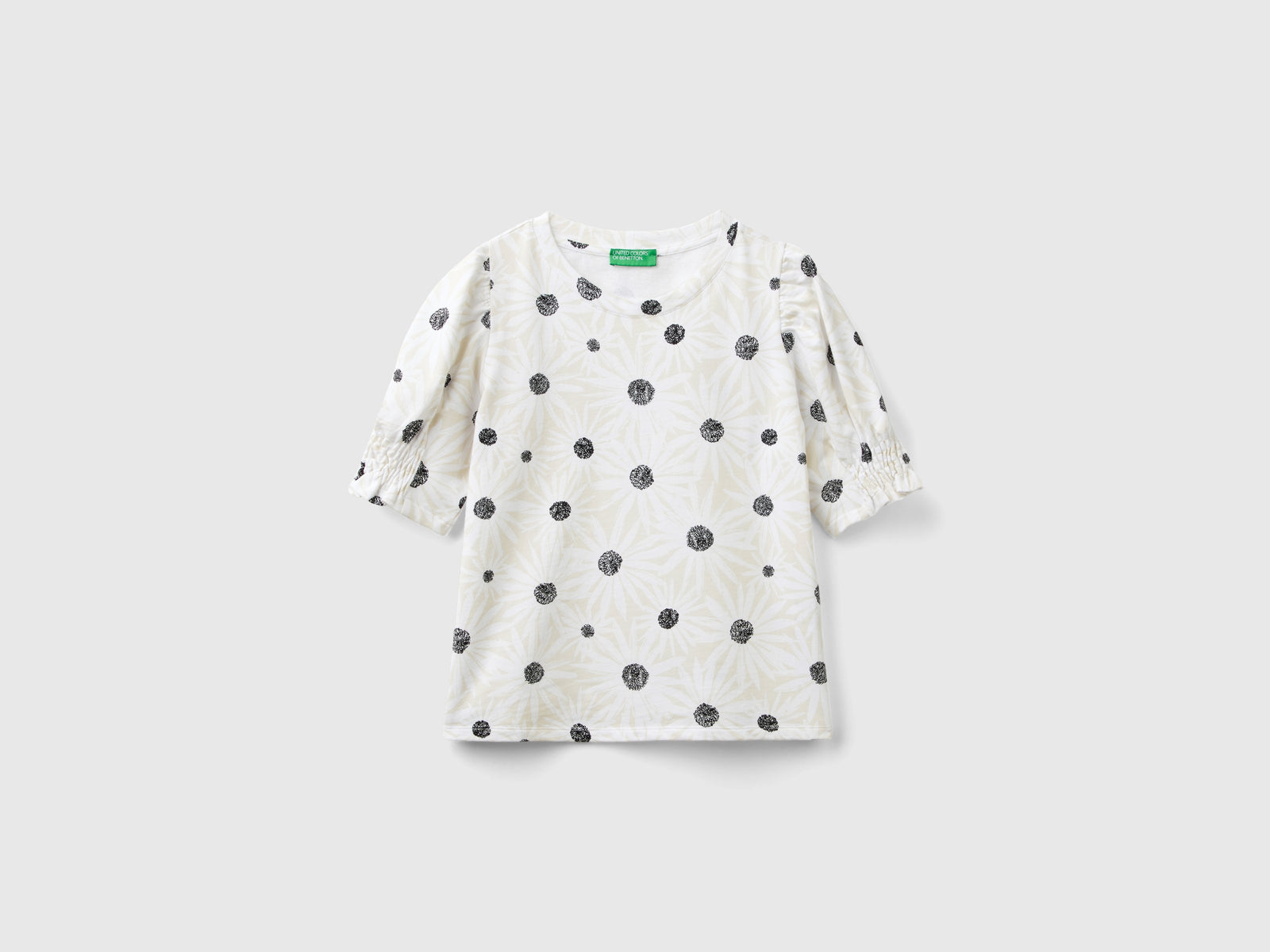 T-shirt in cotone bio con stampa fiori da donna bianco | Benetton Outlet