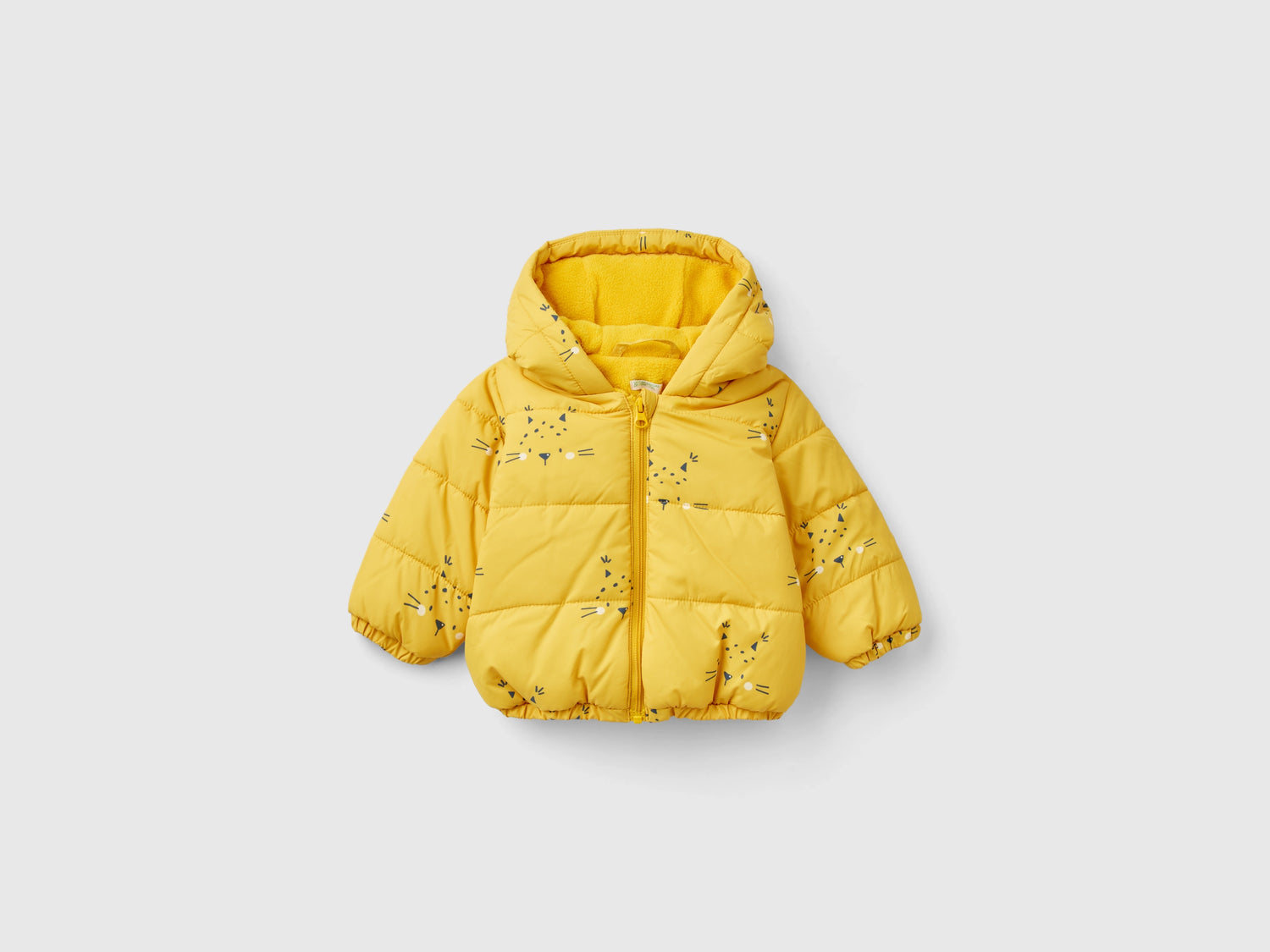 Giubbotto fantasia con zip e cappuccio da neonato giallo | Benetton Outlet