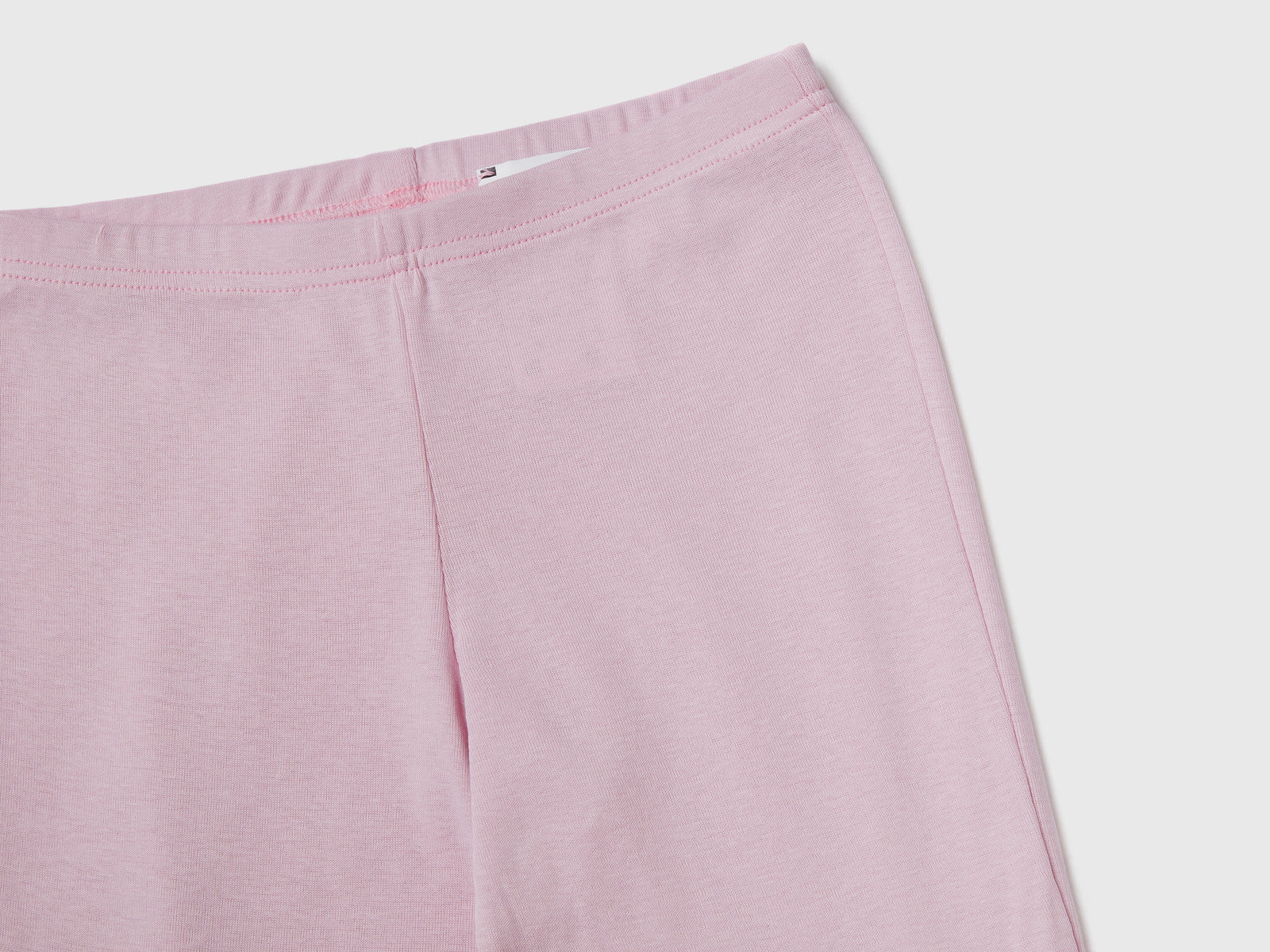 Pigiama lungo slim fit a costine da bambina rosa pastello 2 | Benetton Outlet