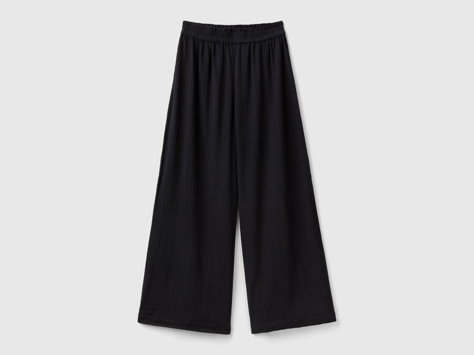 Pantaloni con gamba ampia da donna nero | Benetton Outlet