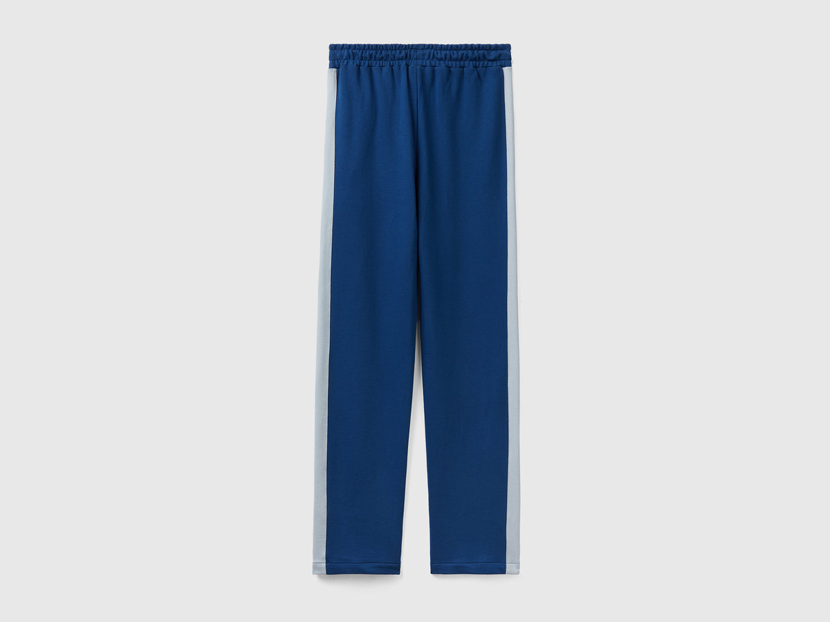 Pantaloni con banda a contrasto