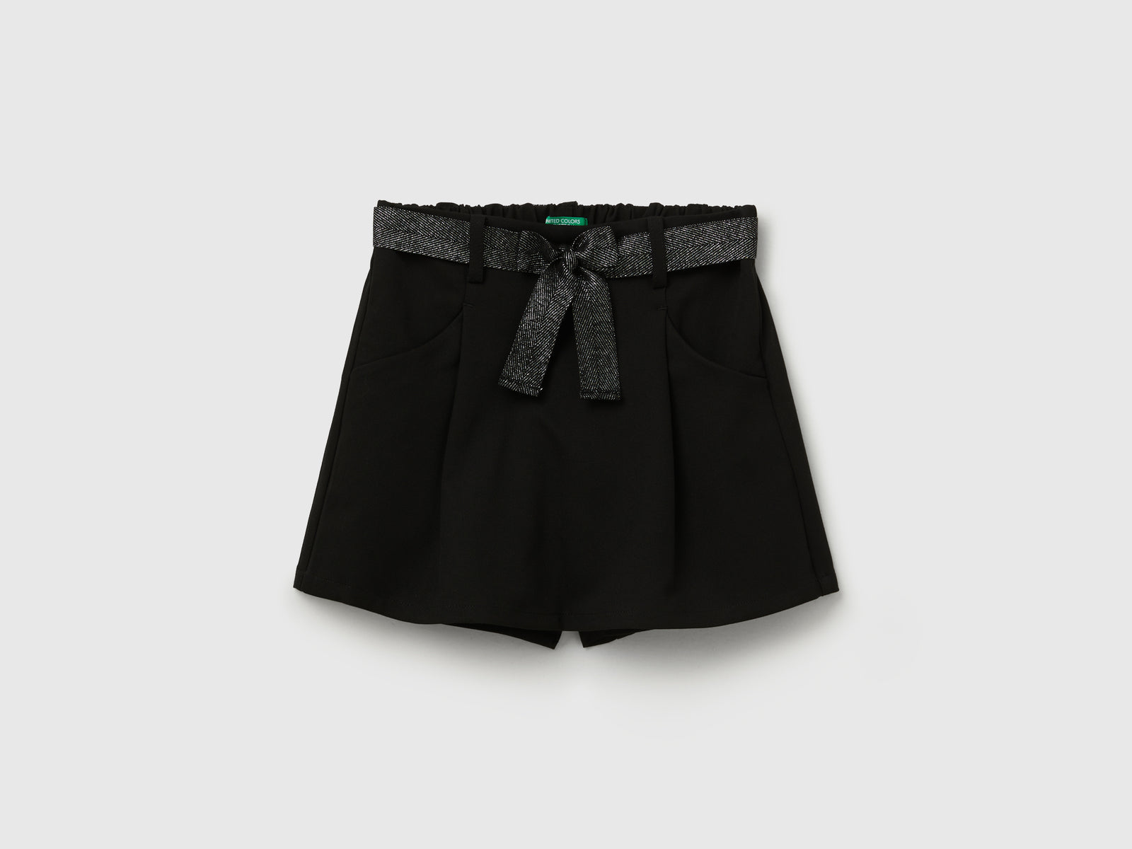 Gonna pantalone con cintura da bambina nero | Benetton Outlet
