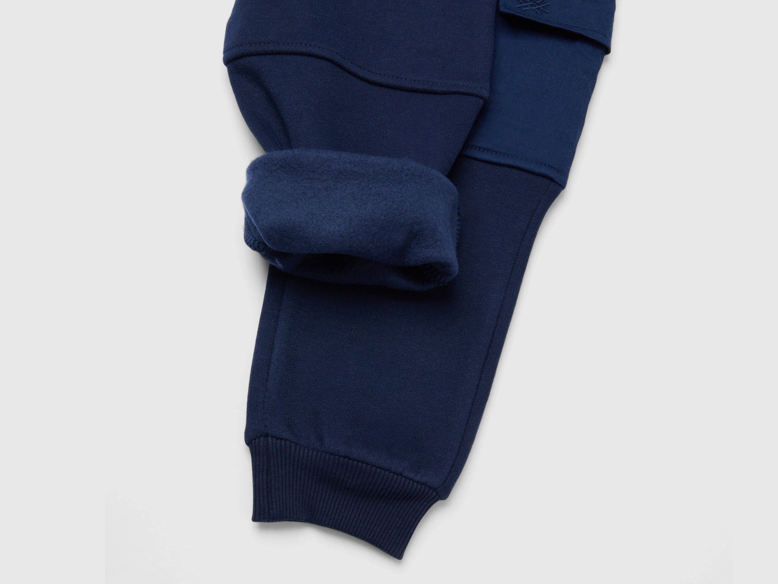 Joggers in calda felpa con tasca laterale da bimbo blu scuro 3 | Benetton Outlet