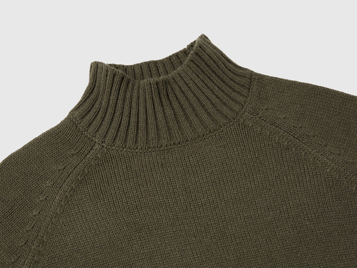Maglione dolcevita over fit con frange