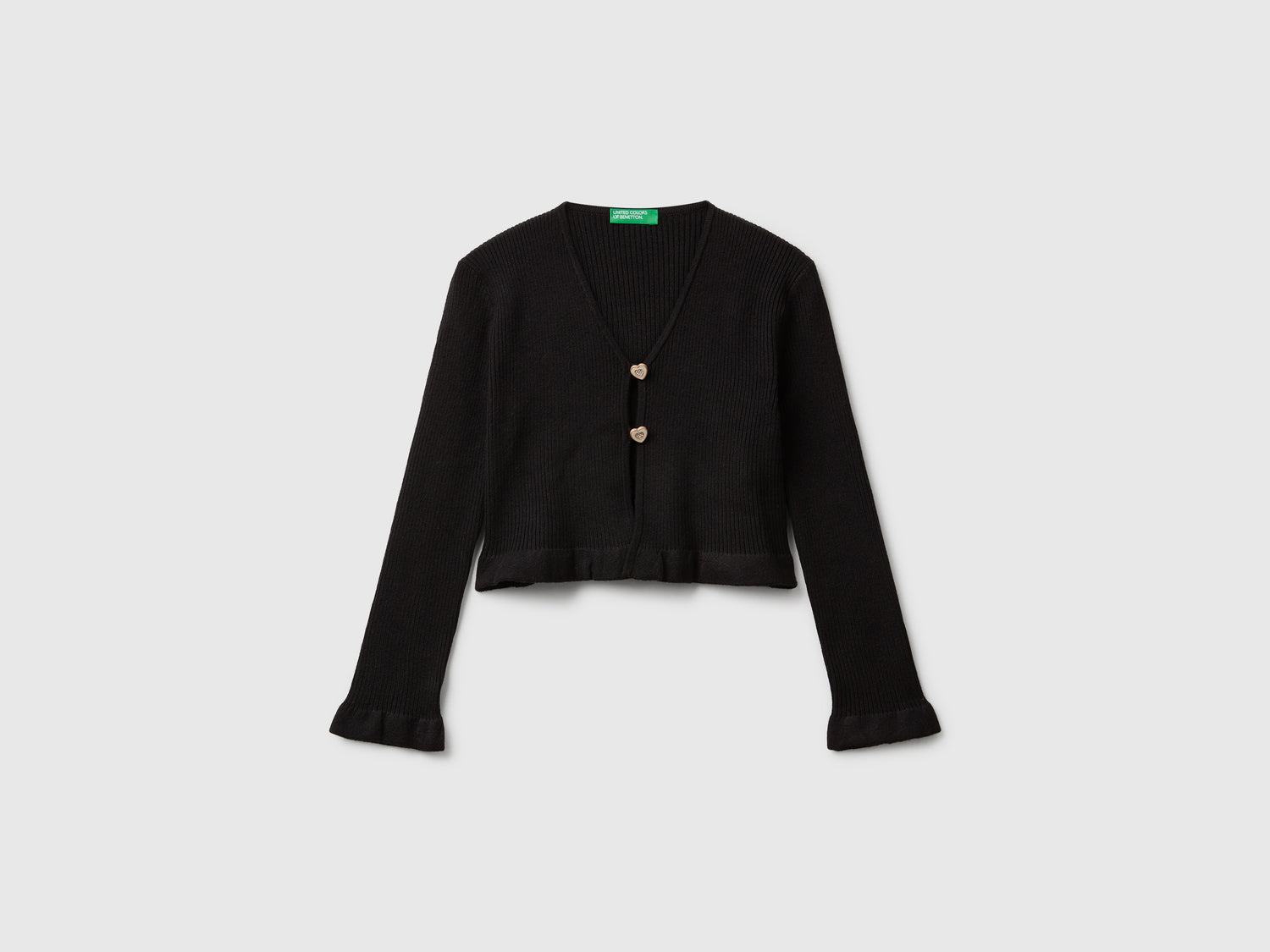 Cardigan con bottoni cuoricino da bambina nero | Benetton Outlet