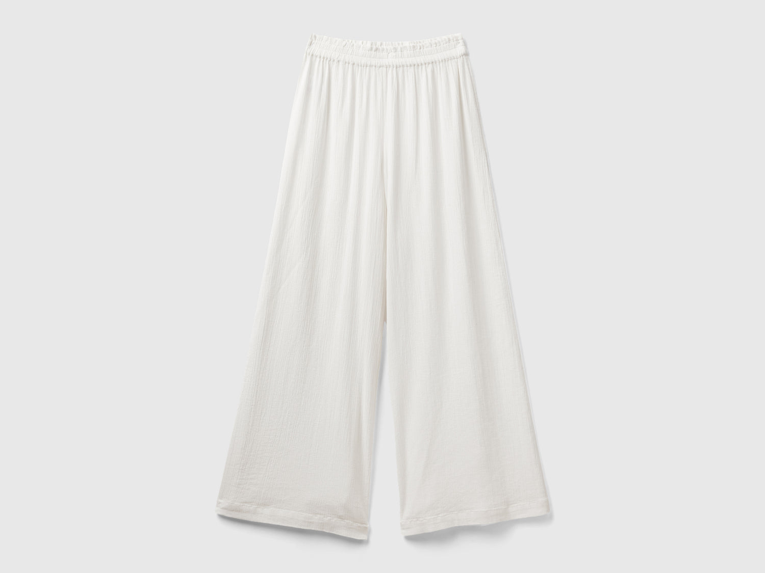 Pantaloni con gamba ampia da donna bianco panna | Benetton Outlet
