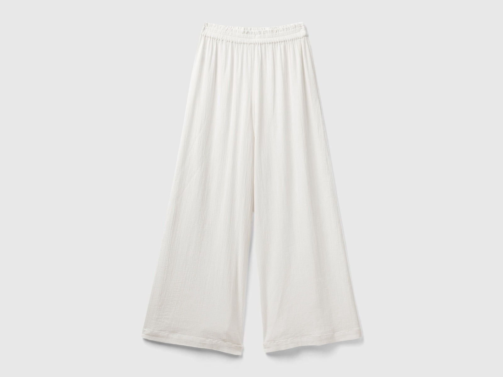 Pantaloni con gamba ampia da donna bianco panna | Benetton Outlet