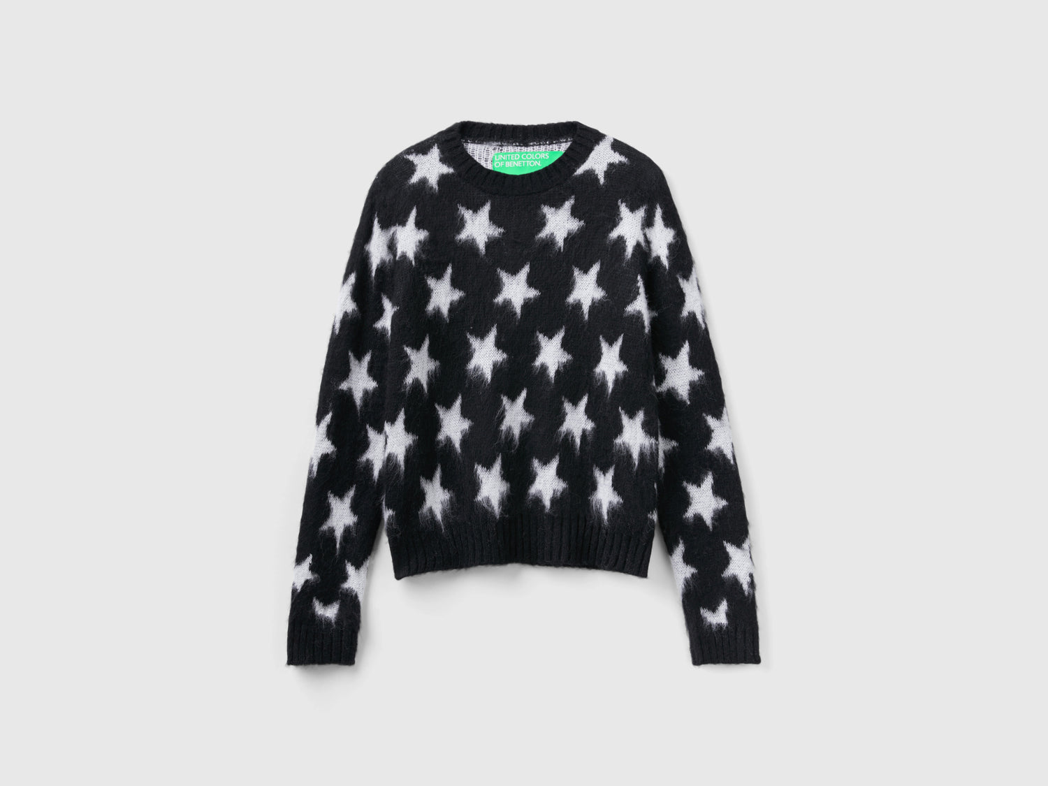 Calda maglia con stelle da donna nero | Benetton Outlet