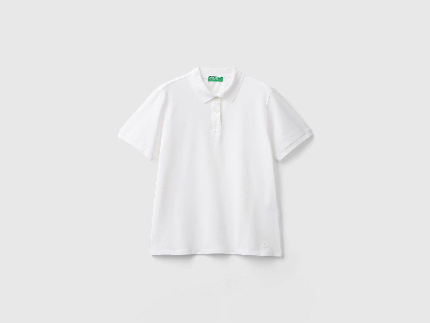 Polo in cotone bio stretch da donna bianco | Benetton Outlet