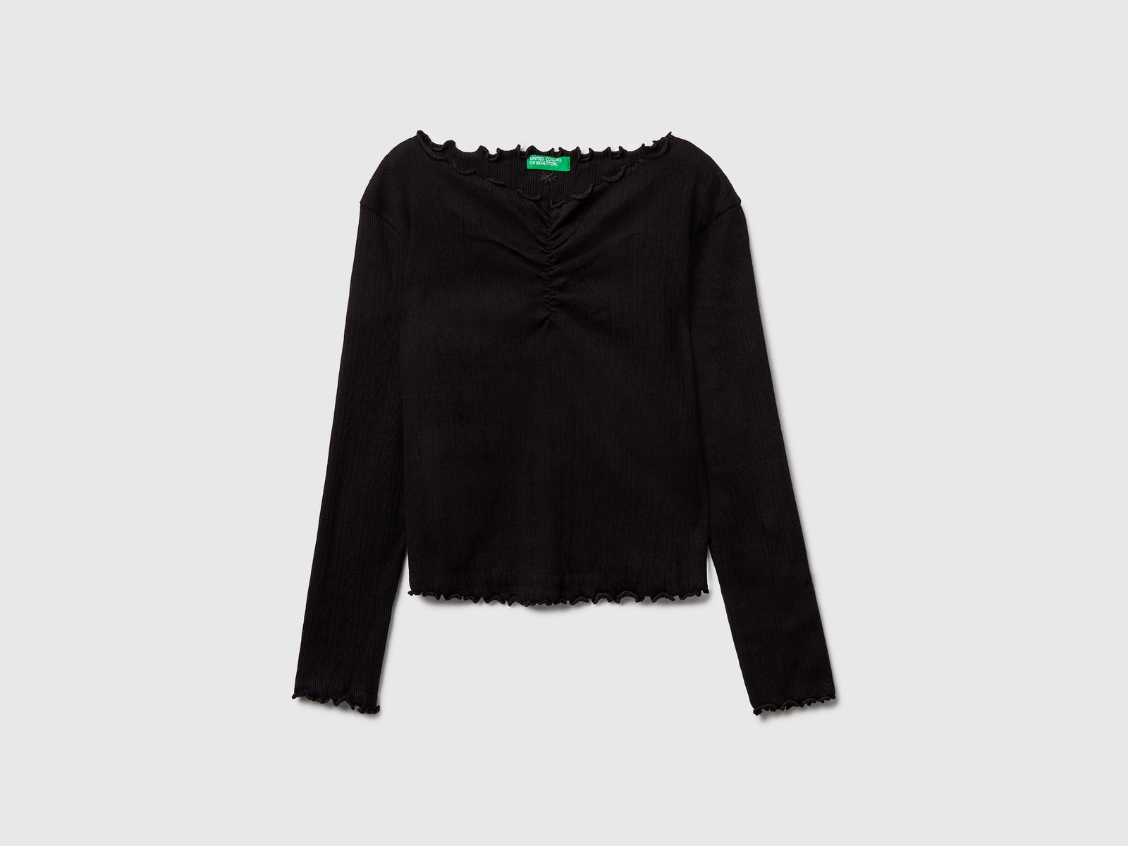 Maglietta con bordi ondulati da bambina nero | Benetton Outlet