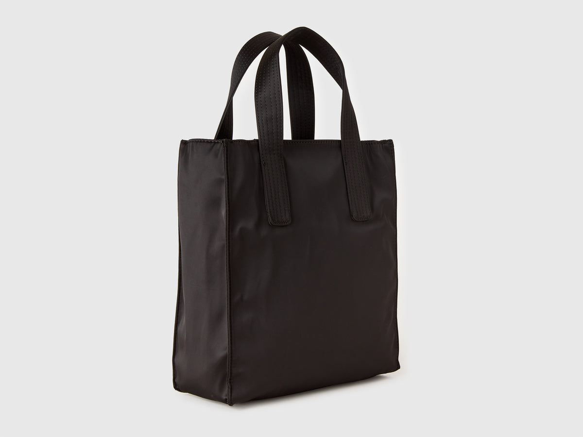 Shopping bag con tasche