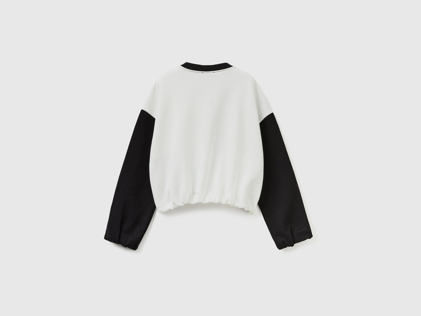 Felpa con maxi quadri da bambina bianco 2 | Benetton Outlet