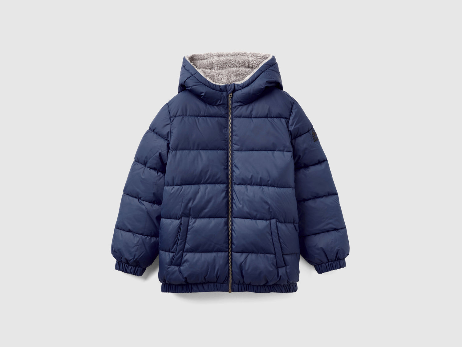 Giubbotto imbottito con interno orsetto da bambino blu scuro | Benetton Outlet