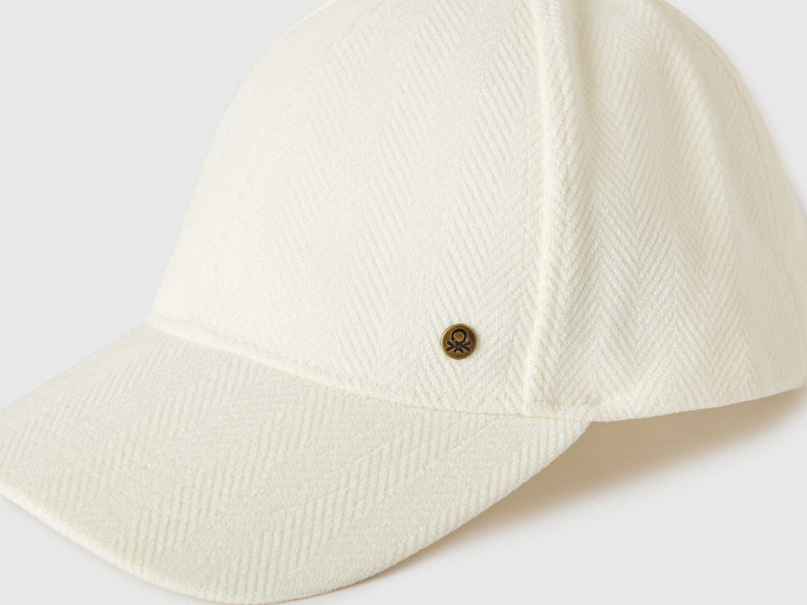 Cappello baseball con motivo a spina da donna bianco panna 3 | Benetton Outlet