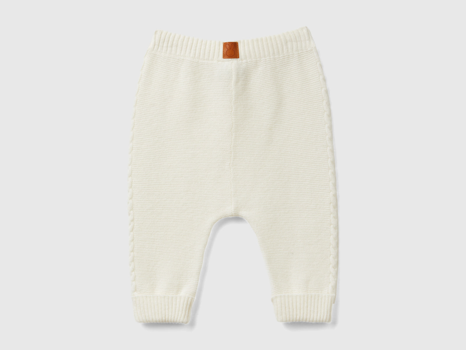 Pantaloni con trecce in misto lana riciclata da neonato bianco panna 2 | Benetton Outlet